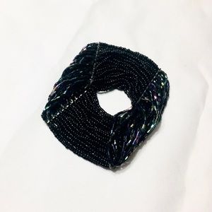 Black shell and bead stretch bracelet